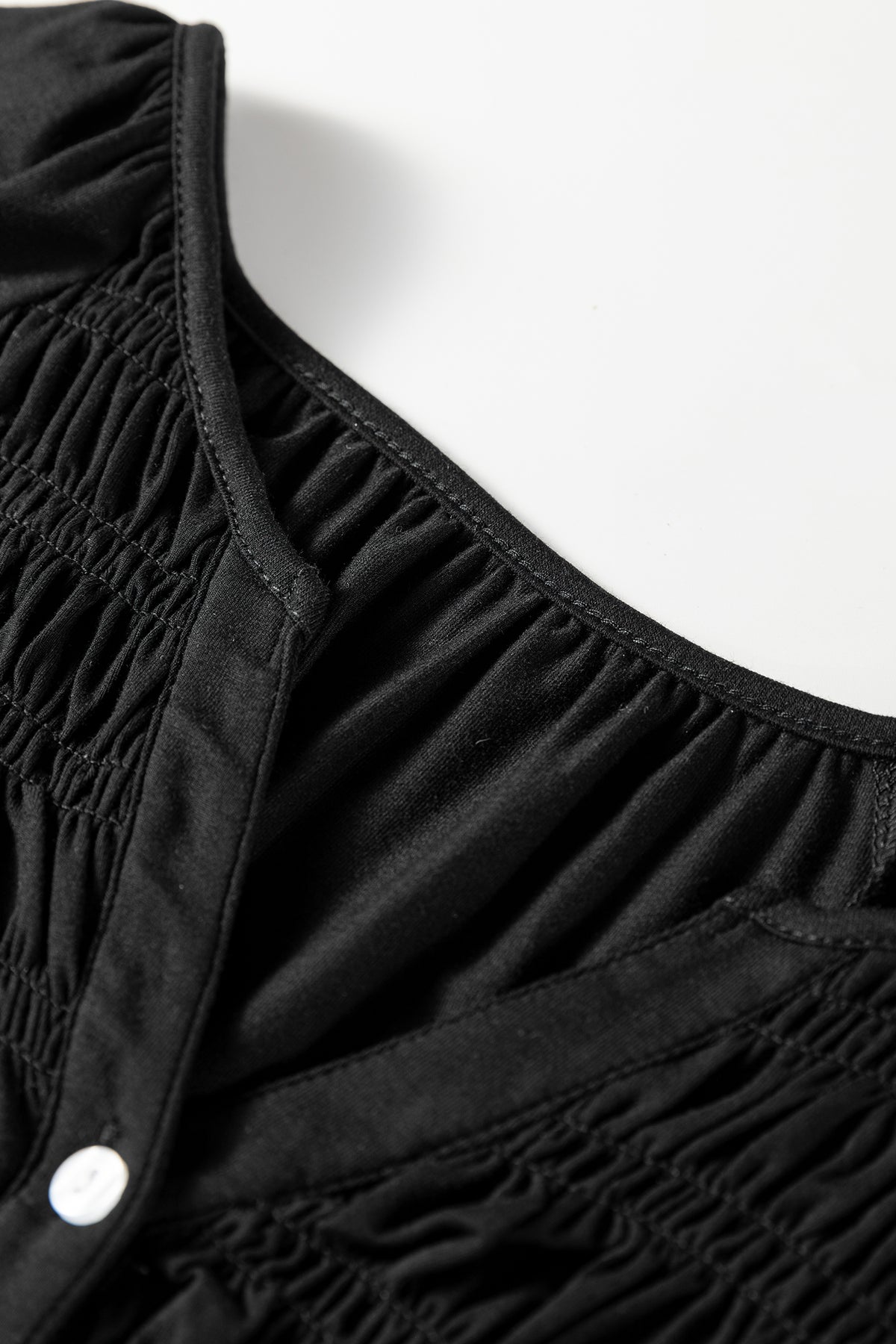 Black Smocked Bust Buttoned Split V Neck Flow Fit Blouse
